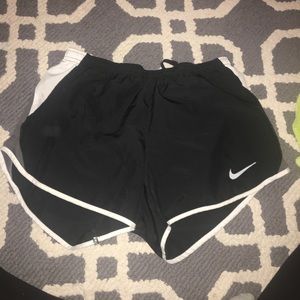 Black Nike running shorts